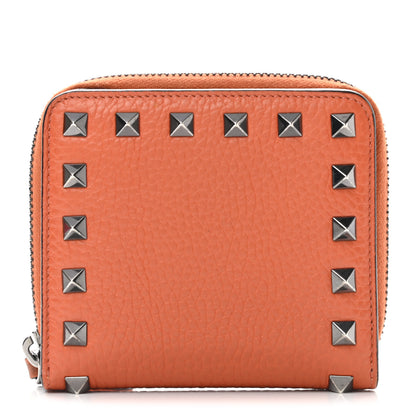 Valentino Garavani Pebbled Calfskin Rockstud Compact Zip Around Wallet Orange 1 of 11