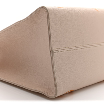 Louis Vuitton Empreinte Monogram Giant By The Pool Onthego MM Cream Saffron 8 of 9