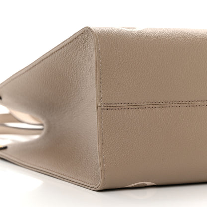 Louis Vuitton Empreinte Monogram Giant Onthego MM Tourterelle Creme 1 of 9