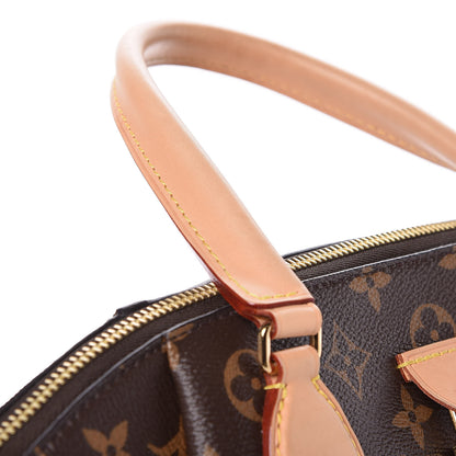 Louis Vuitton Monogram Rivoli MM 9 of 12