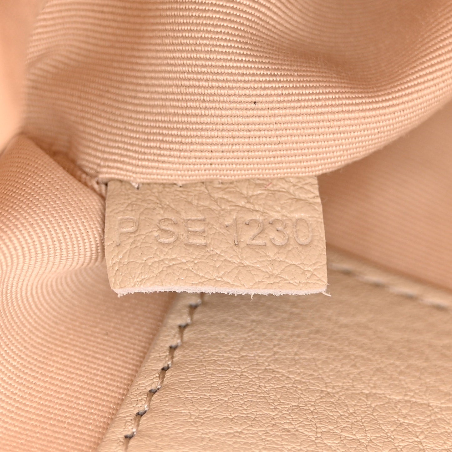 Grained Calfskin Quilted The Status Round Crossbody Oatmilk