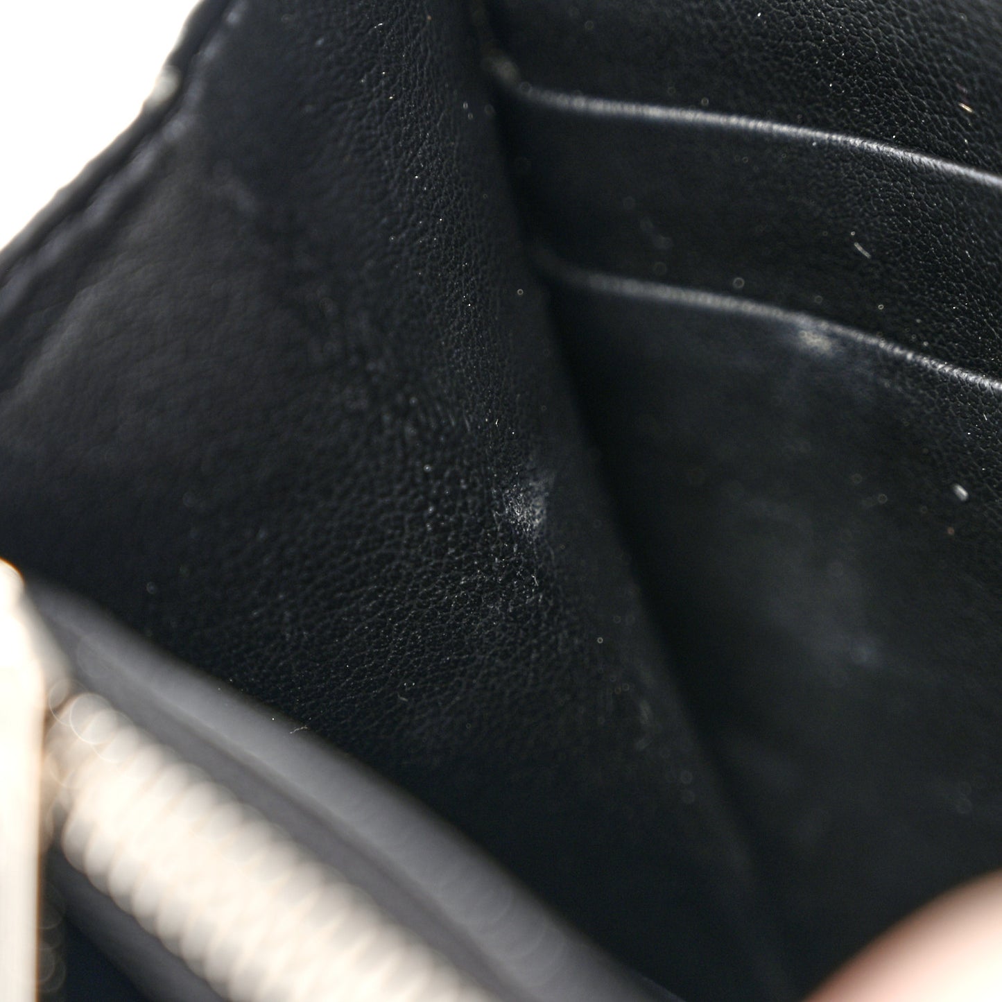 Calfskin Logo Star Embossed Zip Around Wallet Black