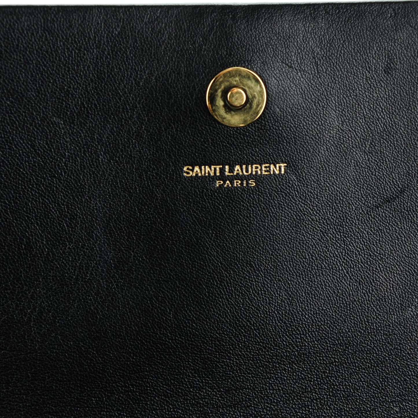 Suede Cassandre Tassel Clutch Black