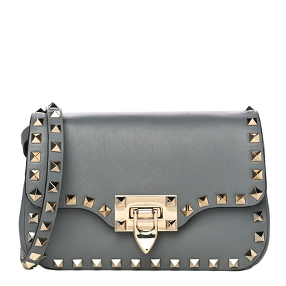 Valentino Garavani Vitello Mini Rockstud Flap Saddle Crossbody Bag Light Stone 1 of 15