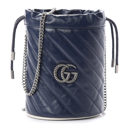 Gucci Vintage Effect Calfskin Matelasse Diagonal Mini Torchon GG Marmont 2.0 Bucket Bag Blue Agata Mystic White 1 of 11