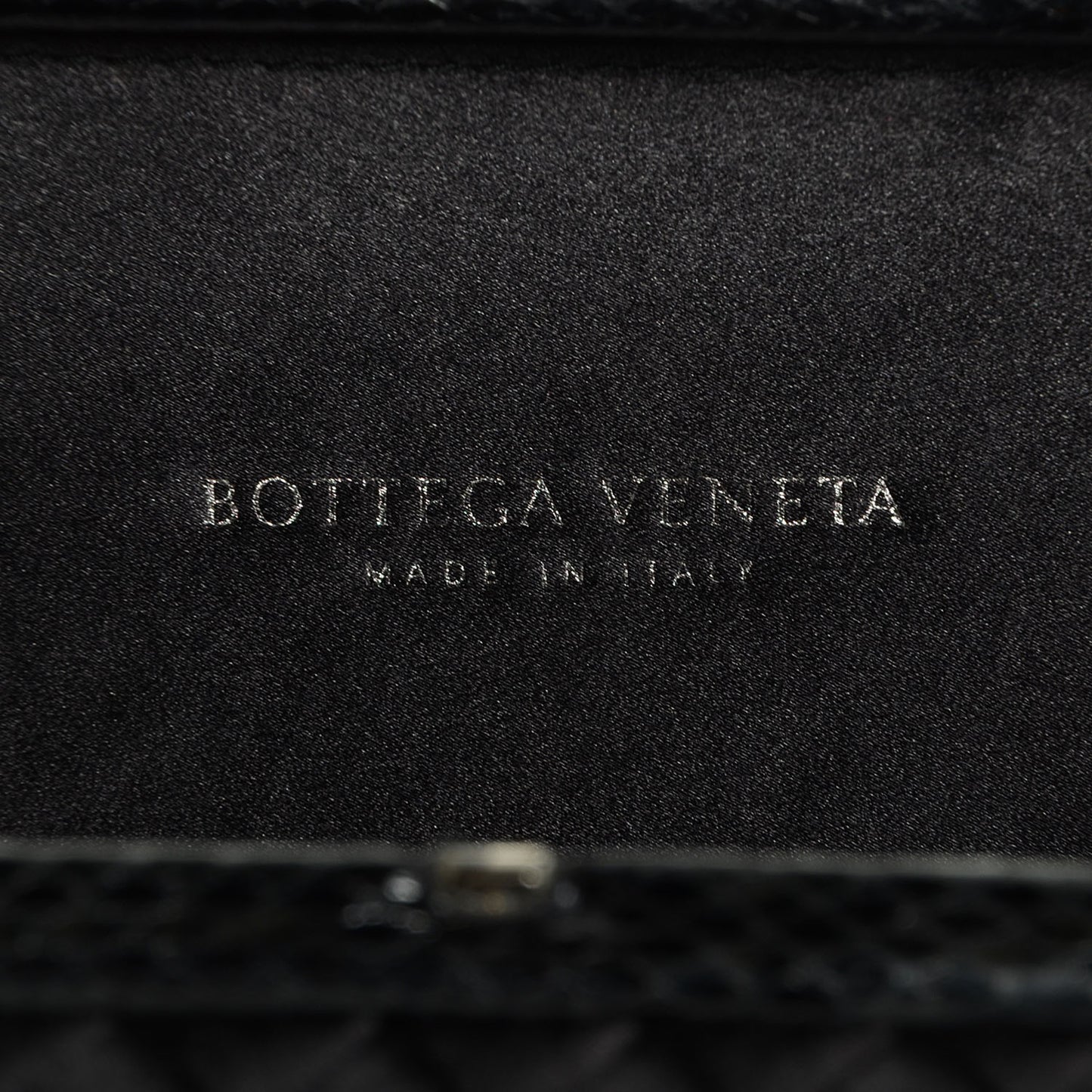 Satin Intreccio Impero Ayers Knot Clutch Black
