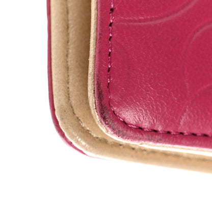Chanel Lambskin Camellia Embossed Yen Wallet Fuchsia 9 of 10