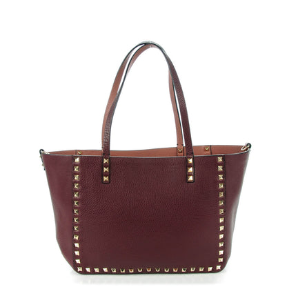 Valentino Garavani Pebbled Calfskin Small Rockstud Reversible Tote Rubin Blush 1 of 7