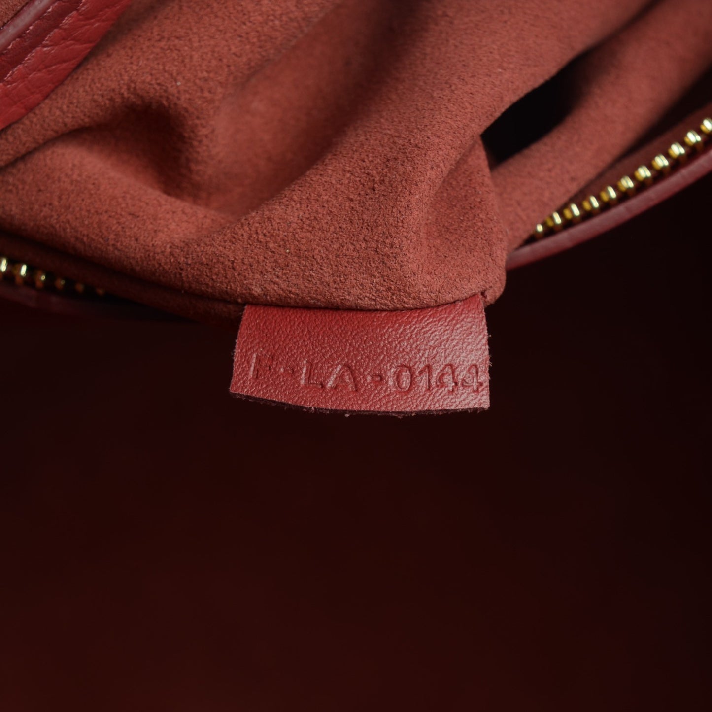 Supple Calfskin Medium Phantom Luggage Red