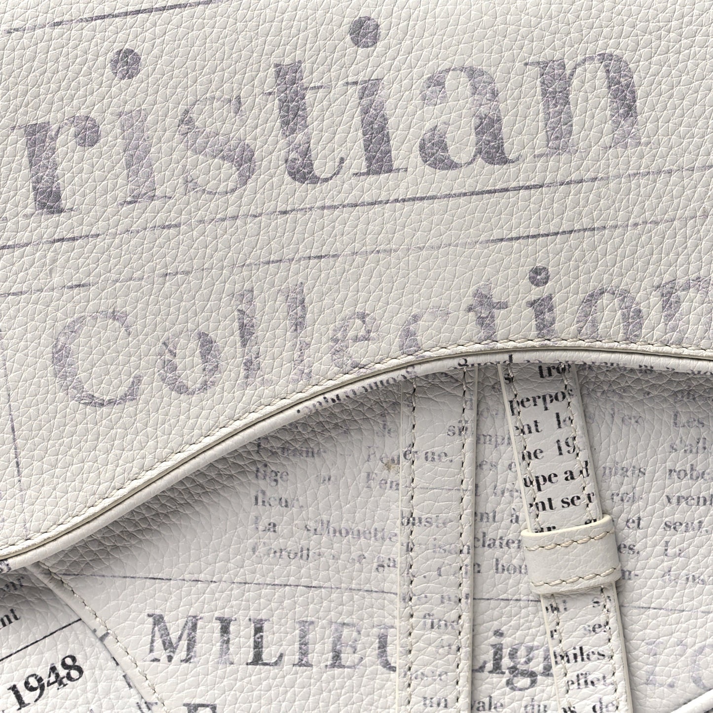 X DANIEL ARSHAM Grained Calfskin Newspaper Print Saddle Bag White