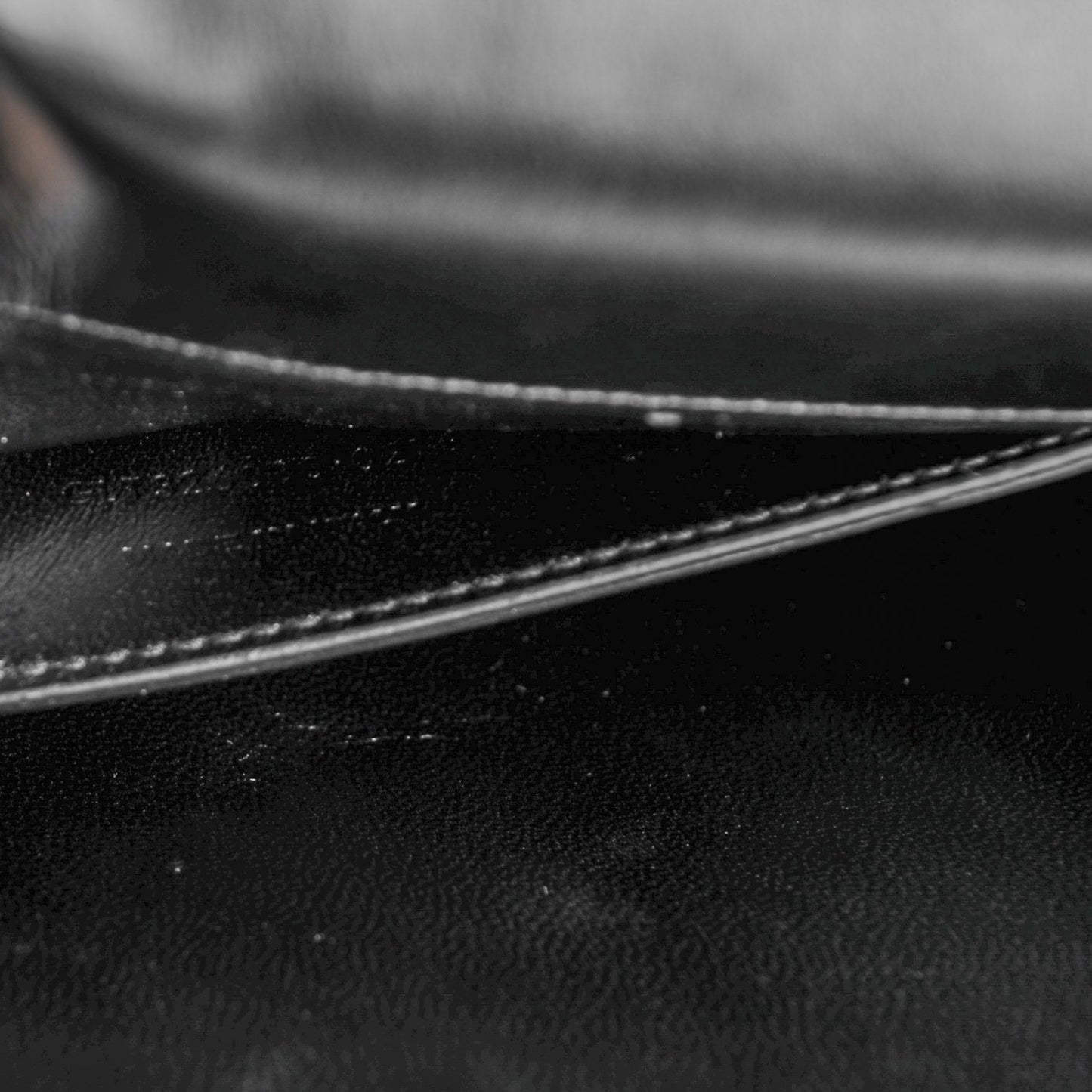 Suede Cassandre Tassel Clutch Black