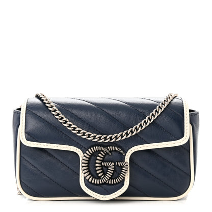 Gucci Vintage Effect Calfskin Matelasse Diagonal Super Mini Torchon GG Marmont Shoulder Bag Blue Agata Mystic White 1 of 10