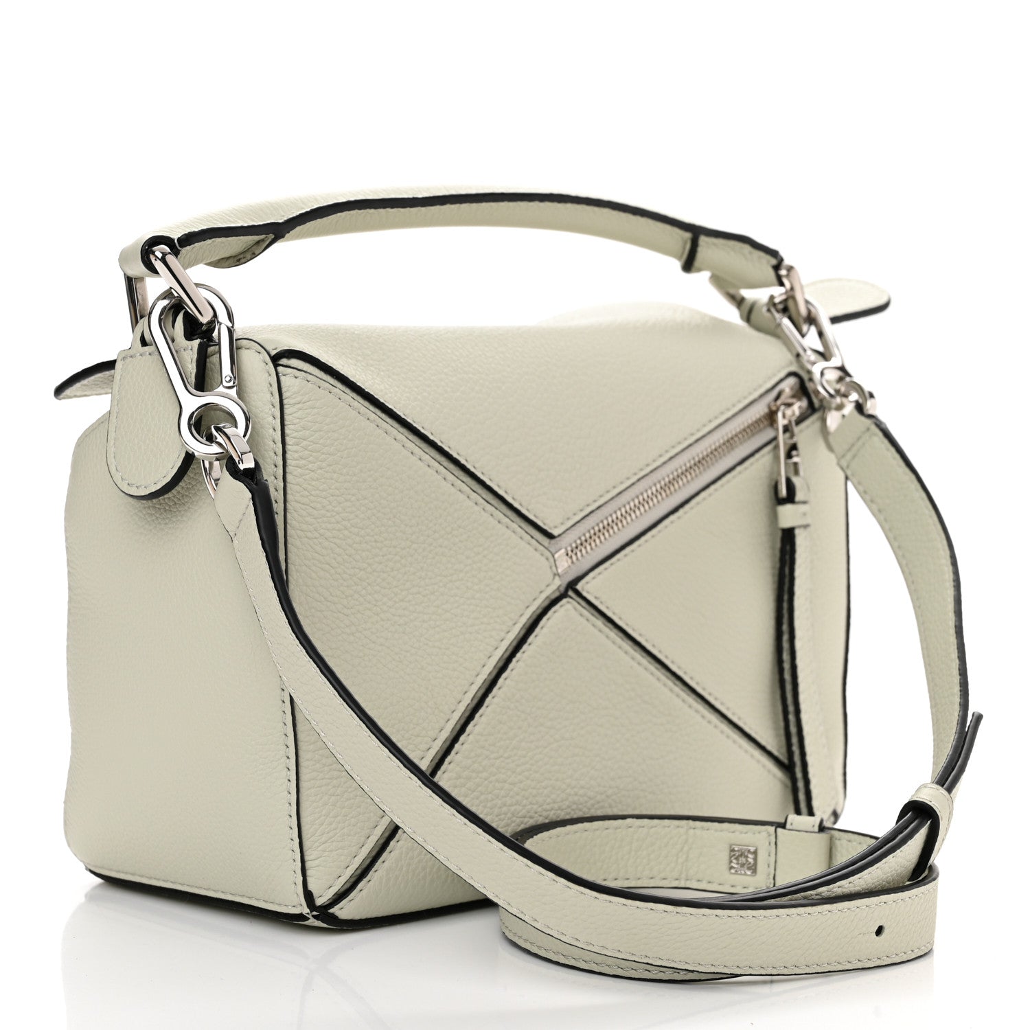 This is a side view image of a LOEWE Grained Calfskin Puzzle Bag in size small by fashionphile