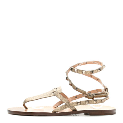 Valentino Garavani Metallic Pebbled Calfskin Rockstud Ankle Wrap Flat Thong Sandals 40 Skin 1 of 9