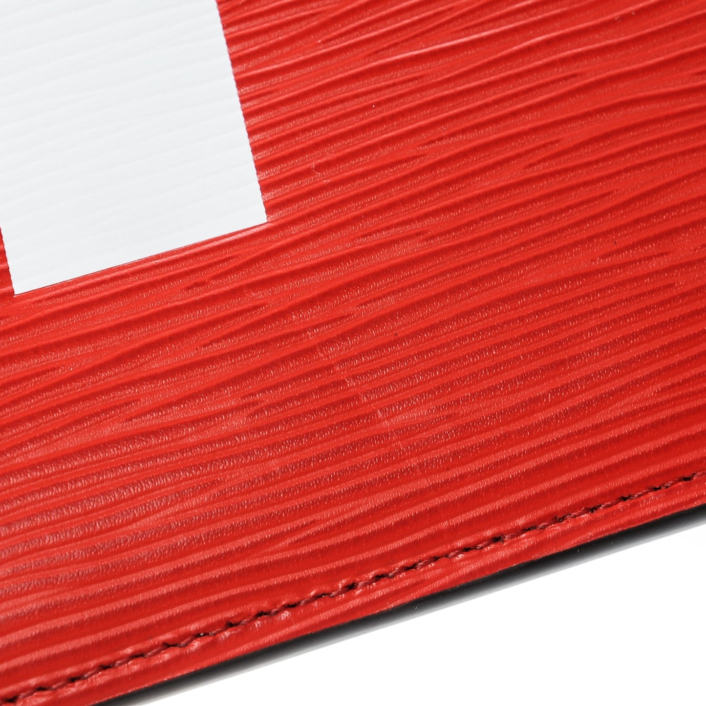 X SUPREME Epi Pochette Jour GM Red