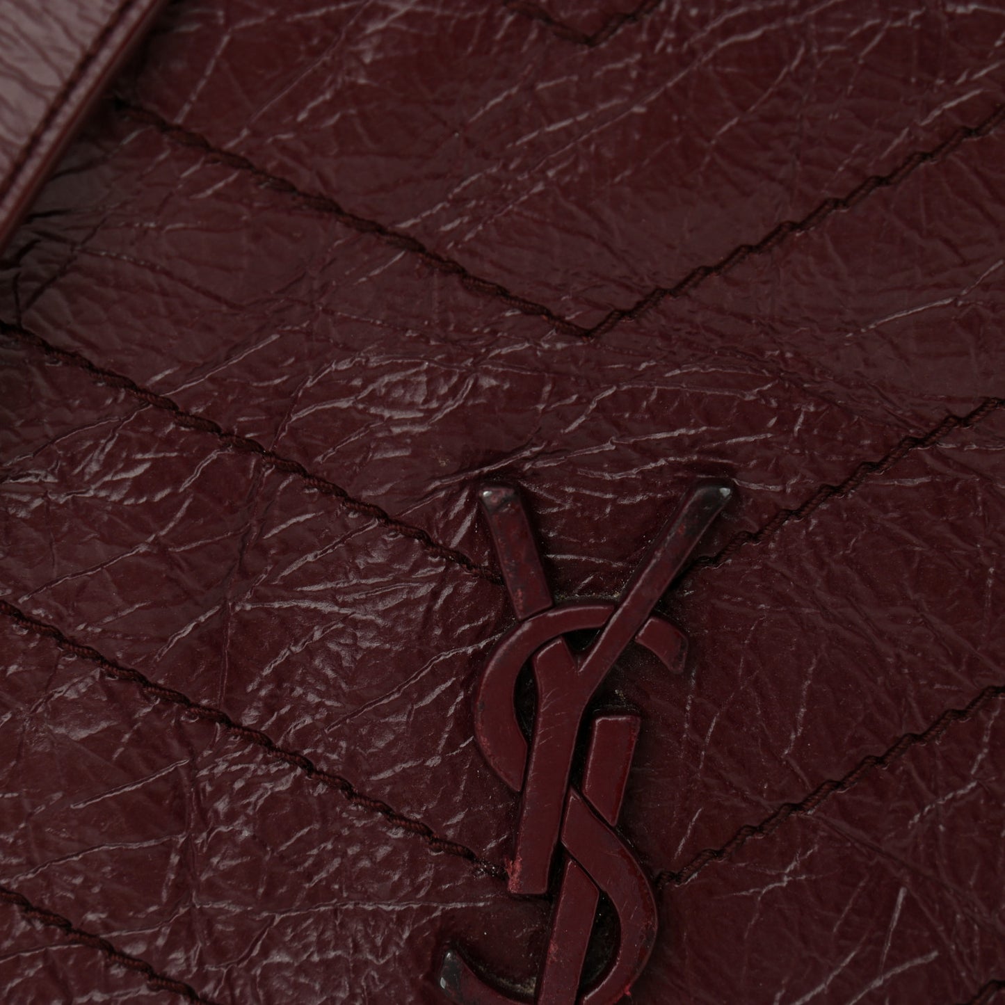 Crinkled Calfskin Matelasse Monogram Niki Chain Wallet Dark Legion Red