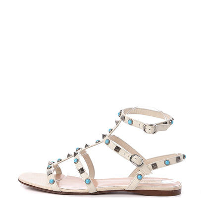 Valentino Garavani Calfskin Turquoise Rockstud Rolling Gladiator Flat Sandals 40 Light Ivory 1 of 8
