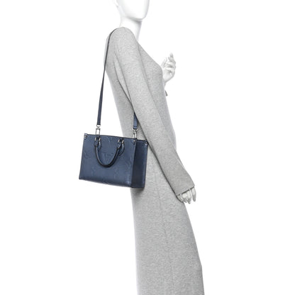 Louis Vuitton Metallic  Empreinte Monogram Giant Onthego PM Navy Nacre 2 of 9