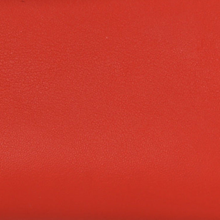 swatch of hermes Rouge Tomate in swift FASHIONPHILE
