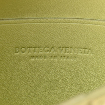 Bottega Veneta Lambskin Maxi Intrecciato Extra Mini Cassette Crossbody Bag Lemon Washed 6 of 9