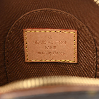 Louis Vuitton Monogram Mini Ellipse Wristlet Clutch 6 of 7