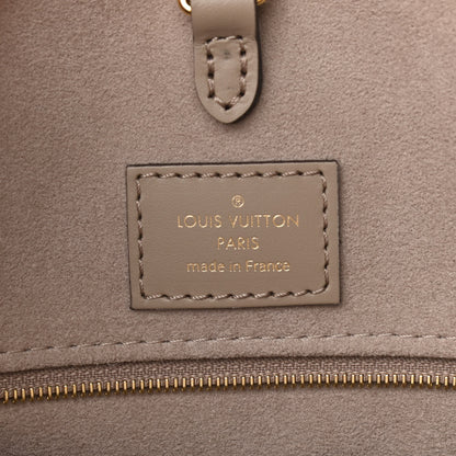 Louis Vuitton Empreinte Monogram Giant Onthego MM Tourterelle Creme 6 of 10