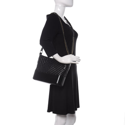 Chanel Aged Calfskin Chevron Quilted Medium Gabrielle Hobo Black 2 of 11