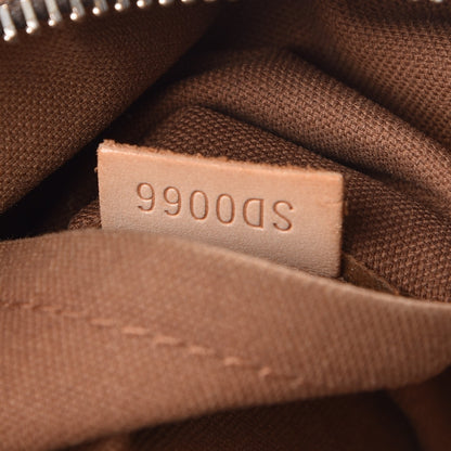 Louis Vuitton Monogram Tulum PM 7 of 14