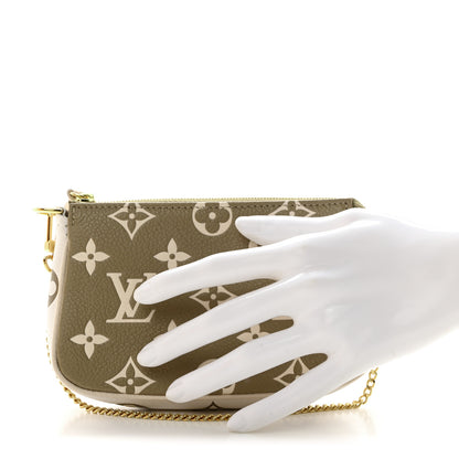 Louis Vuitton Empreinte Spring in the City Mini Pochette Accessories Kaki Beige Cream 2 of 7