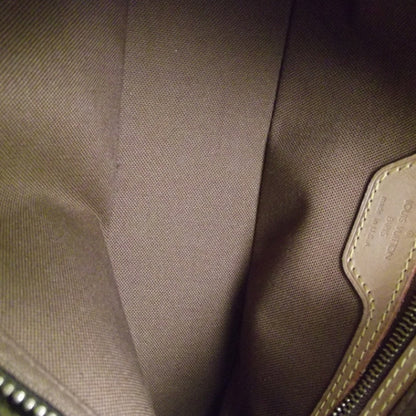 Louis Vuitton Monogram Trotteur 7 of 9