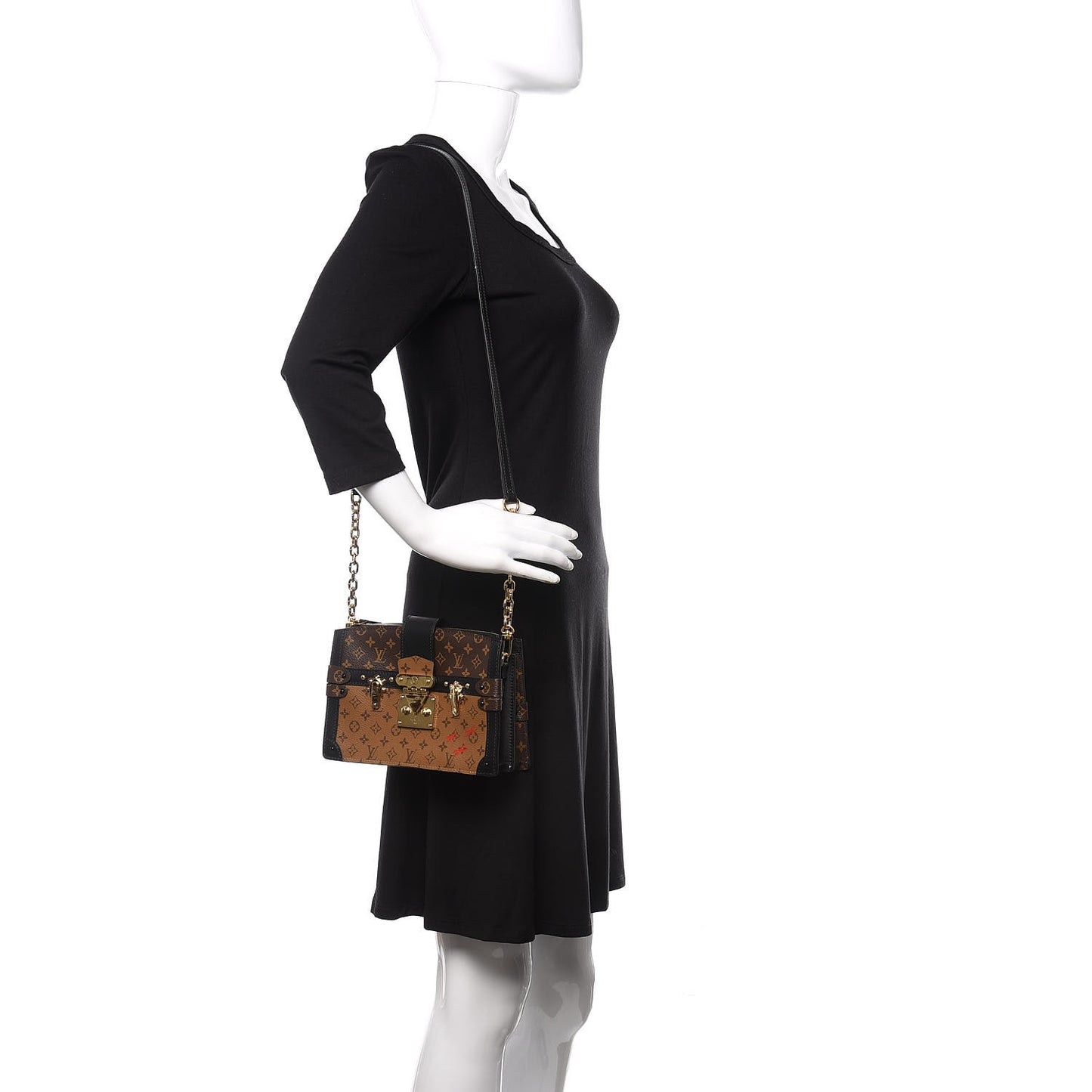 Reverse Monogram Trunk Clutch