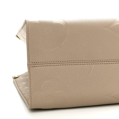 Louis Vuitton LOUIS VUITTON Empreinte Monogram Giant Onthego MM Tourterelle 8 of 9