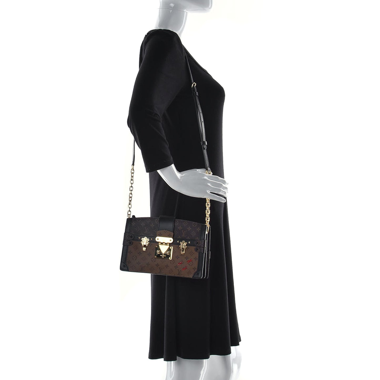 Reverse Monogram Trunk Clutch
