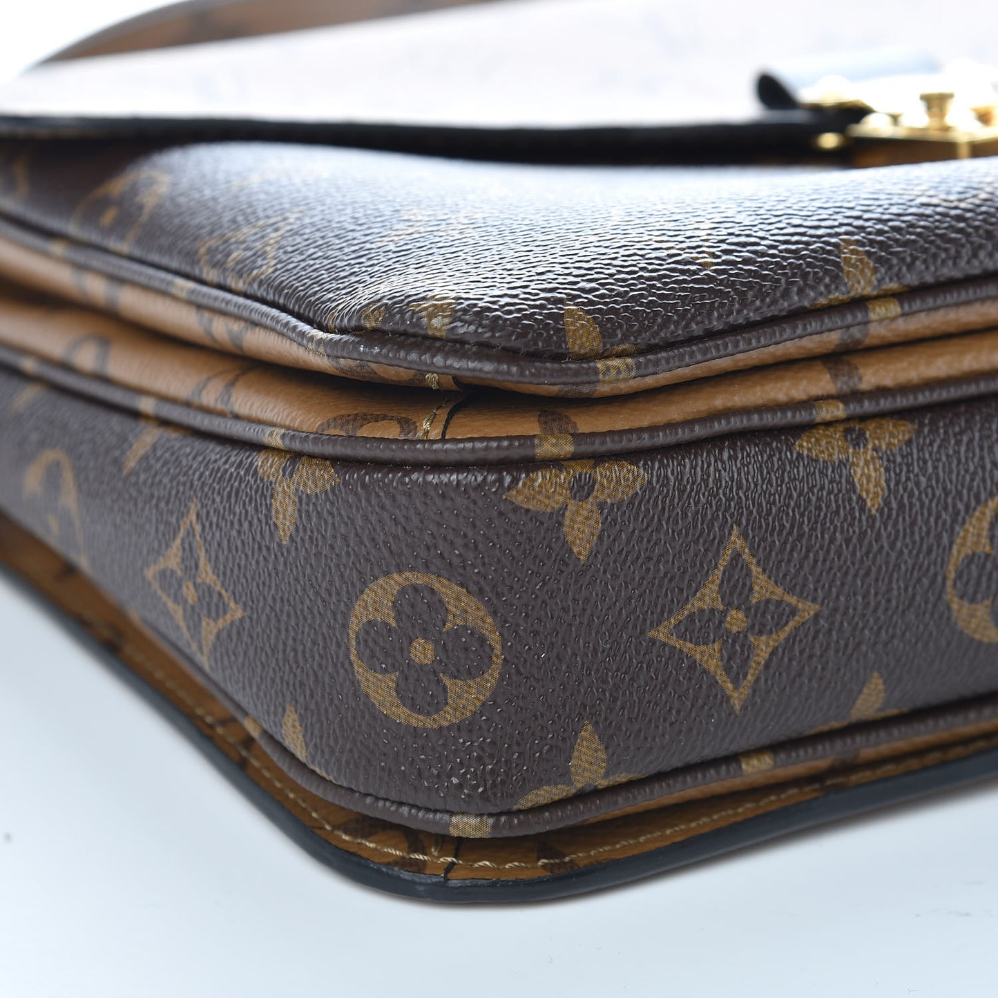 Reverse Monogram Pochette Metis