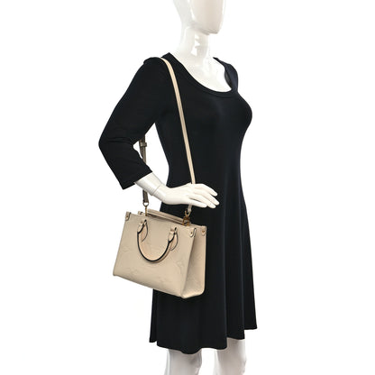 Louis Vuitton Empreinte Monogram Giant Onthego PM Cream Beige 2 of 11