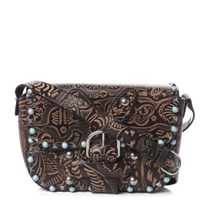 Valentino Garavani Calfskin Santeria Embossed Medium Rockstud Rolling Flap Saddle Bag Brown 1 of 9