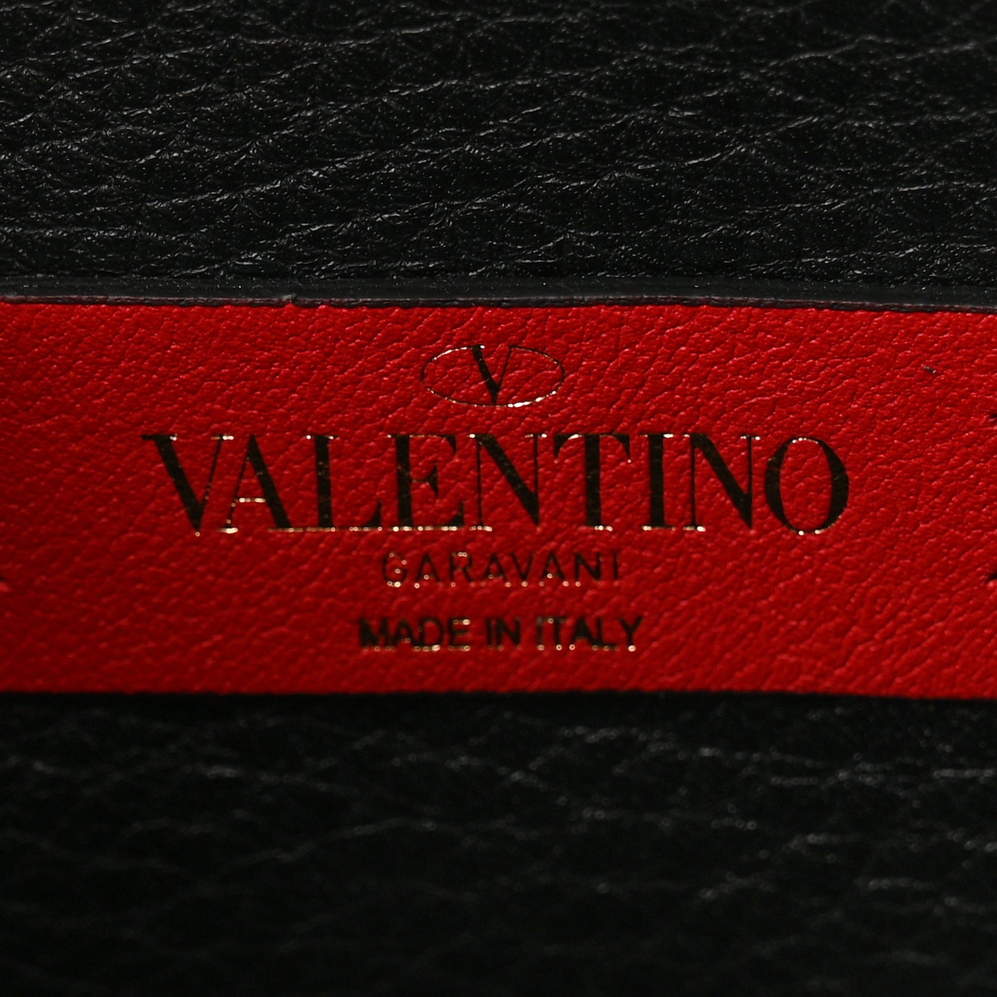 Pebbled Calfskin Rockstud Side Slip Crossbody Black