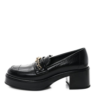 Chanel Shiny Calfskin Logo Loafers 36.5 Black 1 of 9