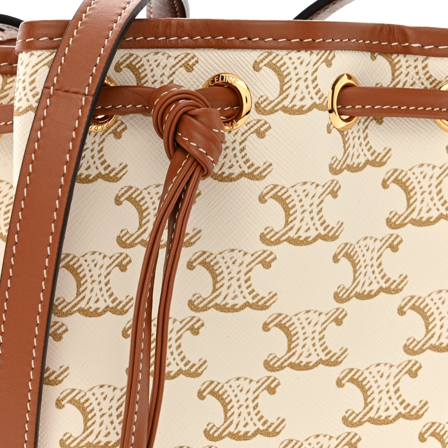 Triomphe Canvas Calfskin Micro Drawstring Bucket Bag White Tan