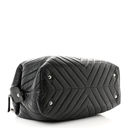 Chanel Aged Calfskin Chevron Quilted Duffle Bag Black 4 of 10