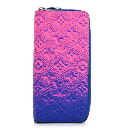 Louis Vuitton Taurillon Illusion Zippy Vertical Wallet Bleu Rose 1 of 11