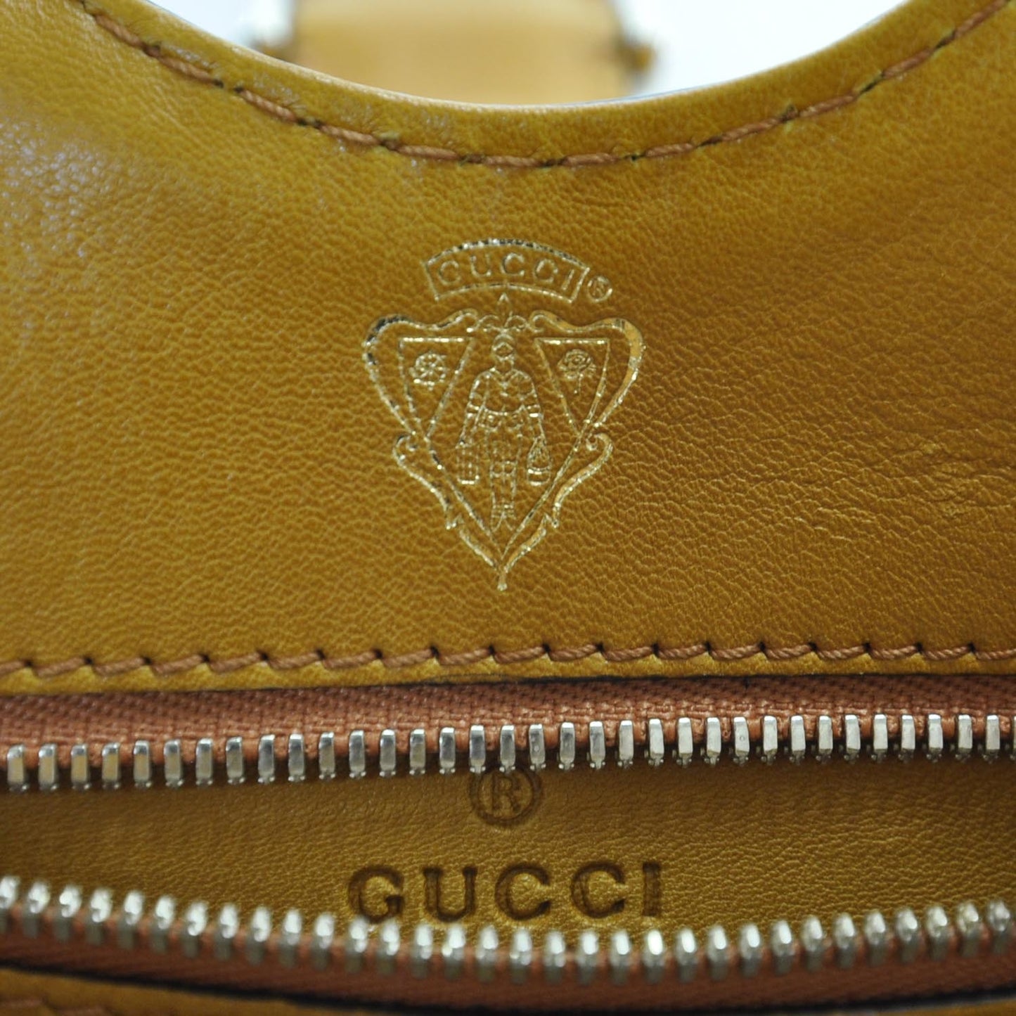 Leather Small Stirrup Top Handle Bag