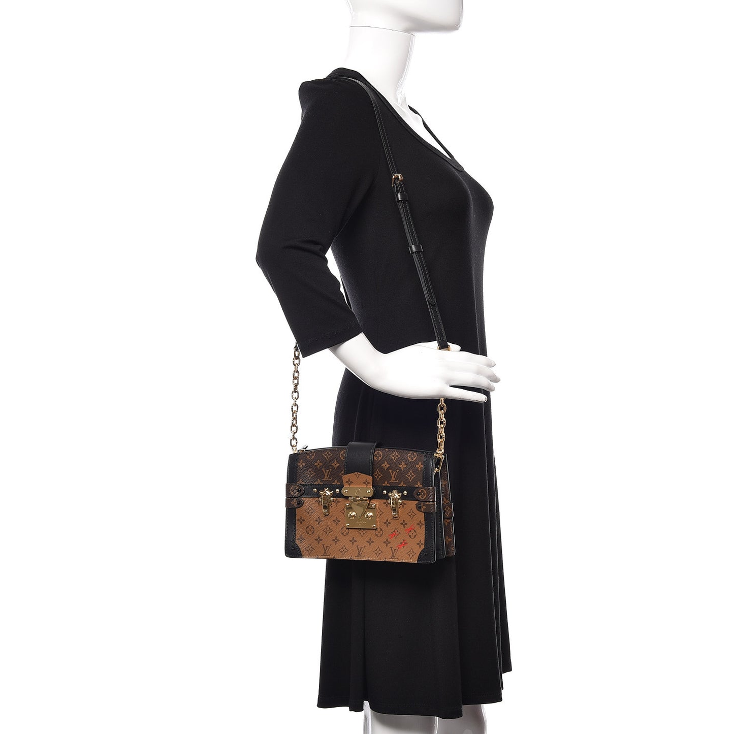 Reverse Monogram Trunk Clutch