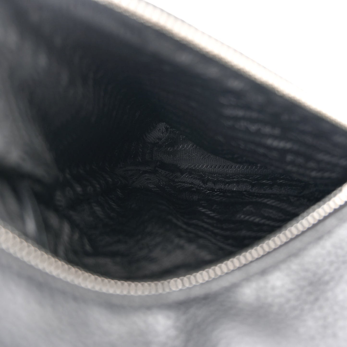 Vitello Daino Logo Embossed Cross Sling Backpack Black