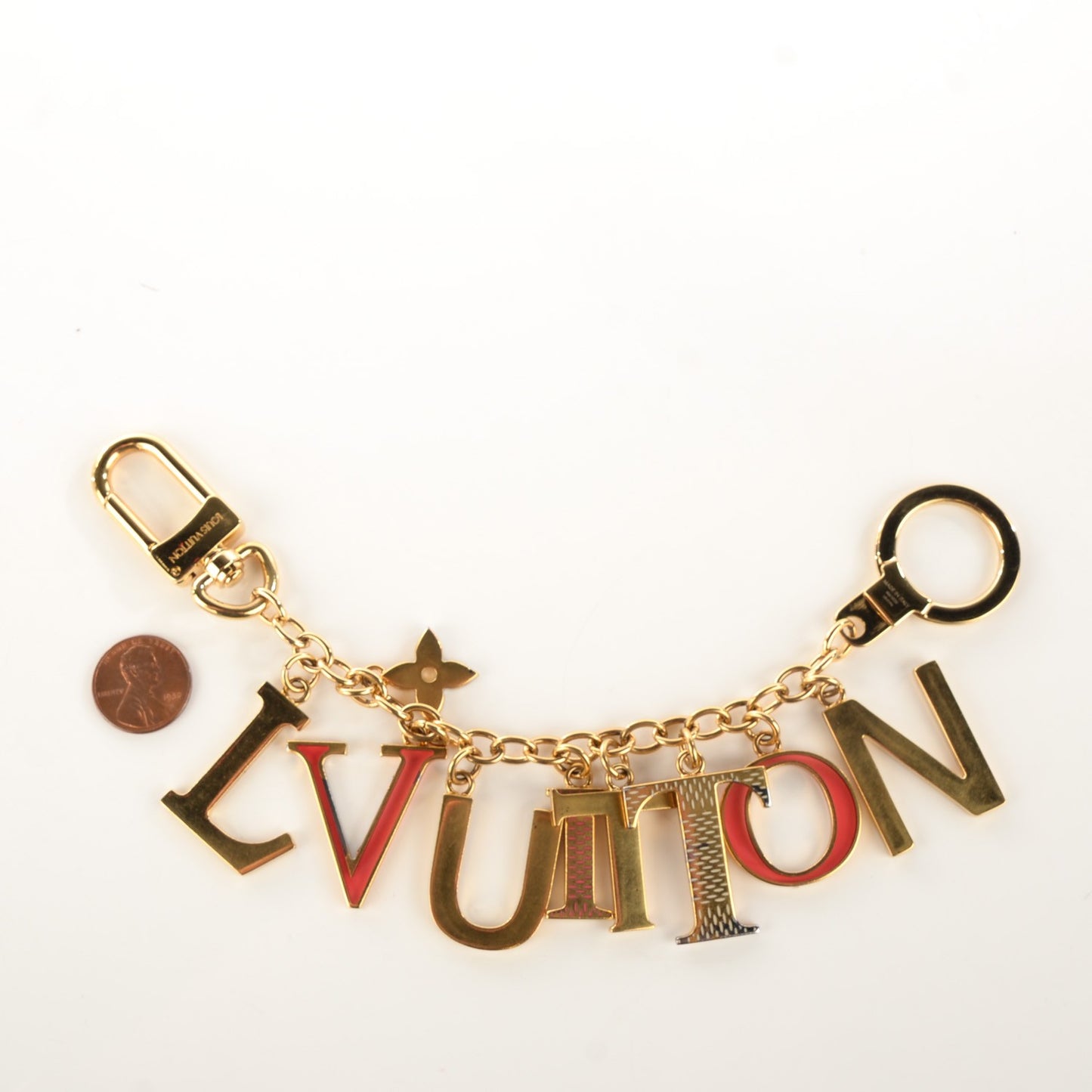 LV Tag Bag Charm Gold