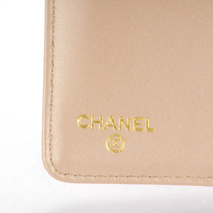 Chanel Lambskin Camellia Embossed Yen Wallet Fuchsia 6 of 8
