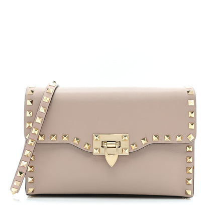 Valentino Garavani Vitello Medium Rockstud Flip Lock Crossbody Bag Poudre 1 of 10