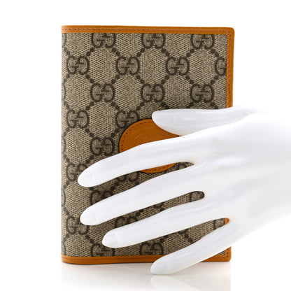 Gucci GG Supreme Monogram Textured Calfskin Retro Interlocking G Passport Case Beige Yellow 2 of 8