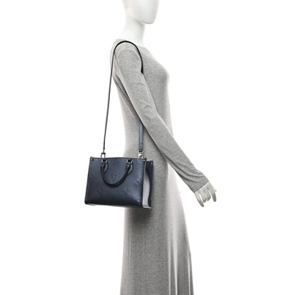 Louis Vuitton Metallic Empreinte Monogram Giant Onthego PM Navy Nacre 2 of 9