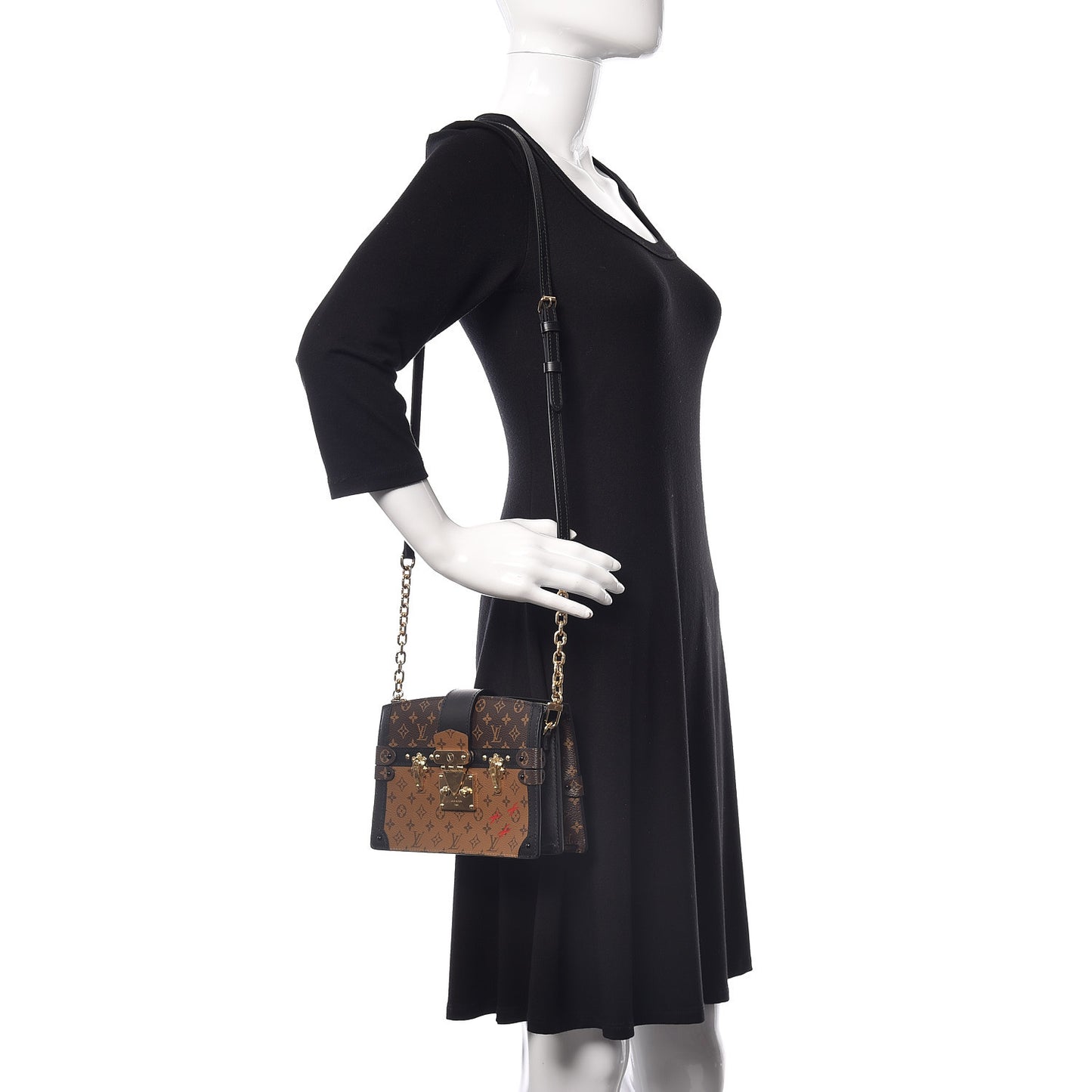 Reverse Monogram Trunk Clutch